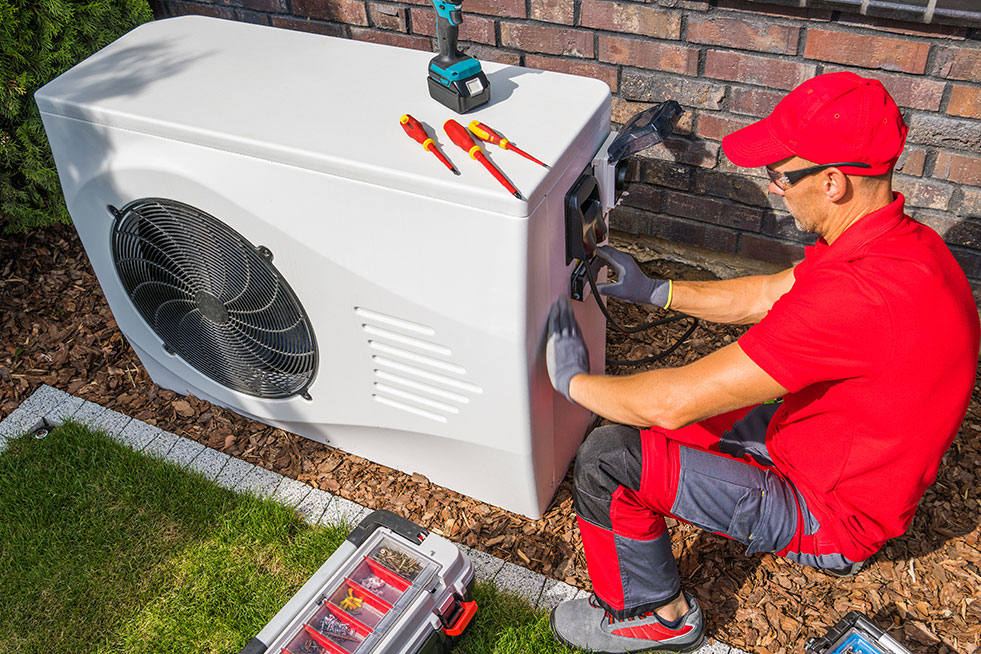 Professional repairing the HVAC systems